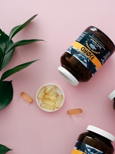 Omega-3 Fish Oil bottle and softgels